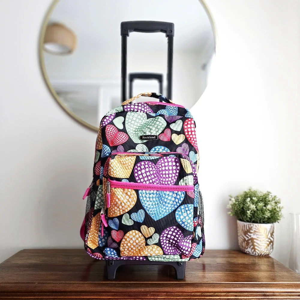 Rockland Rolling Backpack School Bag Travel Luggage Mesh Pockets New Heart 17″